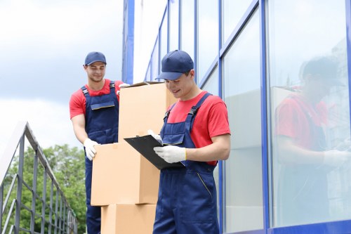 Loading boxes and household items into a van
