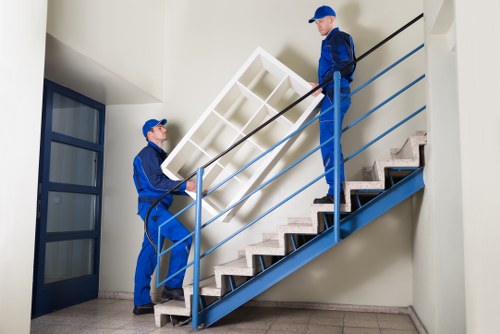 Local moving team handling a Pimlico flat relocation with stairs and narrow access